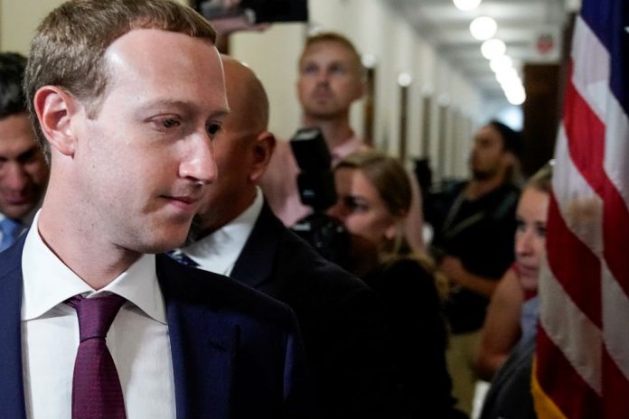 Facebook chief executive Mark Zuckerberg walks past members of the news media as he enters the office of US senator Josh Hawley while meeting with lawmakers to discuss future internet regulation on Capitol Hill in Washington, United States, Sept. 19. JOSHUA ROBERTS/REUTERS