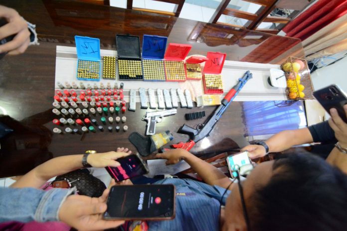 LOOSE GUNS, AMMOS. These are the firearms and bullets that the father of shooting suspect Venom Dio Vergara surrendered to the police of San Jose, Antique. The guns have expired registrations, according to the police. IAN PAUL CORDERO