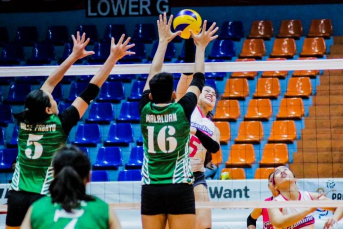 Risa Sato of Creamline Cool Smashers has her shot foiled by PacificTown Army Lady Troopers’ Lutgarda Malaluan. SPORTS VISION PHOTO