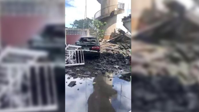 A damaged car and debris from the collapsed Nanfang’ao Bridge are seen after a typhoon hit Su’ao in Yilan county, Taiwan on Oct. 1. XINMEI LIVE SEAFOOD VIA REUTERS