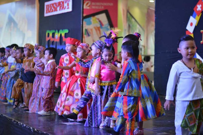 Students of Brilliant Montessori School celebrate United Nations Week.