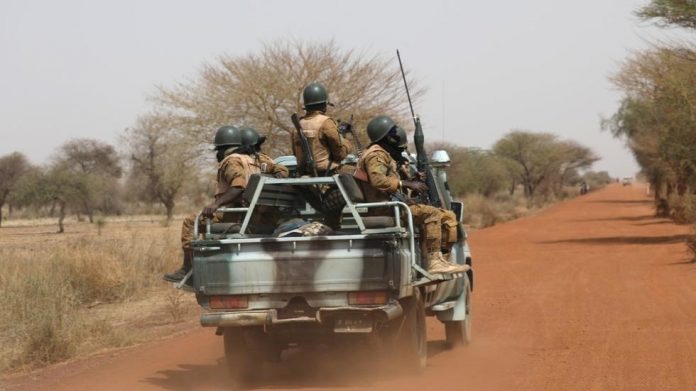 Soldiers patrol on the road of Gorgadji in Sahel, Burkina Faso on March 2019. REUTERS/LUC GNAGO