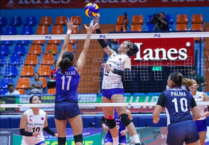 Ilongga Abigail Marano of the Philippine team scores against the defense of fellow Ilongga Fiola Ceballos of PSL Shine. PSL PHOTO