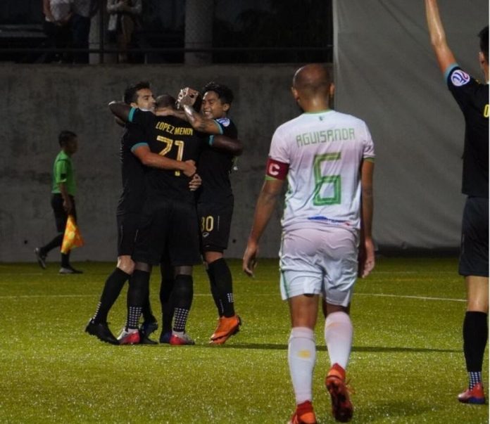 Ceres-Negros FC’s Robert Lopez Mendy is hugged by teammates Bienvenido Marañon and Angelo Marasigan after netting a goal against the Green Archers United FC. PFL PHOTO