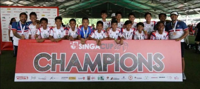 Makati FC boys U14 team celebrates after winning the SingaCup. PHOTO COURTESY OF MAKATI FC