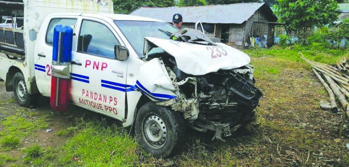 Heavy damage is seen in the front portion of this patrol car of the Pandan municipal police station. POLICE CAPTAIN BRYAN ALAMO