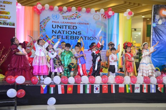 The students of Paul Learning Center in their national costumes singing “It’s A Small World After All.”