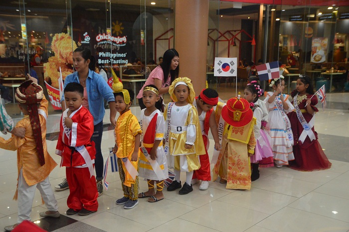 Students line up on their way to the stage to sing the iconic Disney Anthem “It’s A Small World After All”.