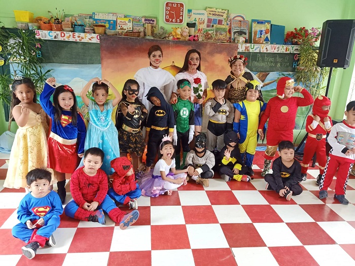 The students of Paul Learning Center in their superhero and princess costumes