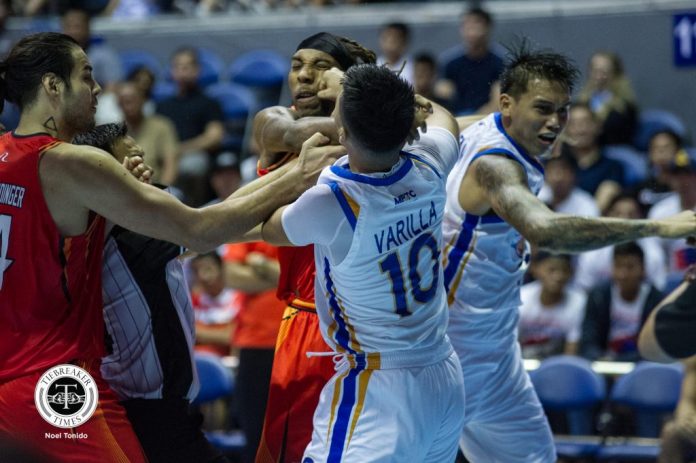 NLEX Road Warriors’ Paul Varilla lands a punch on NorthPort Batang Pier’s import Michael Qualls while NLEX’s John Paul Erram hit him at the back of the neck. Tiebreaker Times Photo