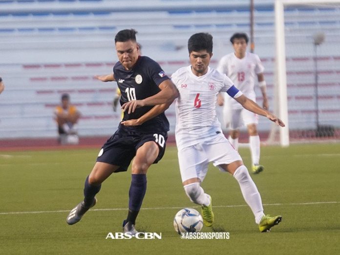 Philippine U-22 Azkals’ Justin Baas battles for the ball with a Myanmar player. ABS-CBN SPORTS PHOTO