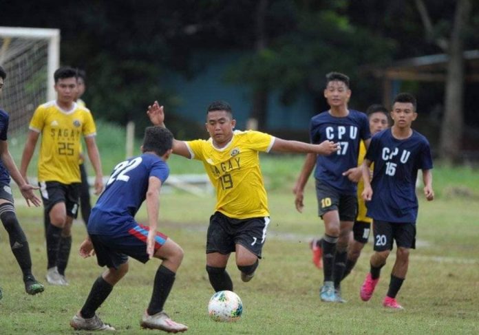 A Sagay City FC player controls the ball while being hounded by a CPU player. PHOTO COURTESY OF FIVE MINUTES OF ADDED TIME BLOG