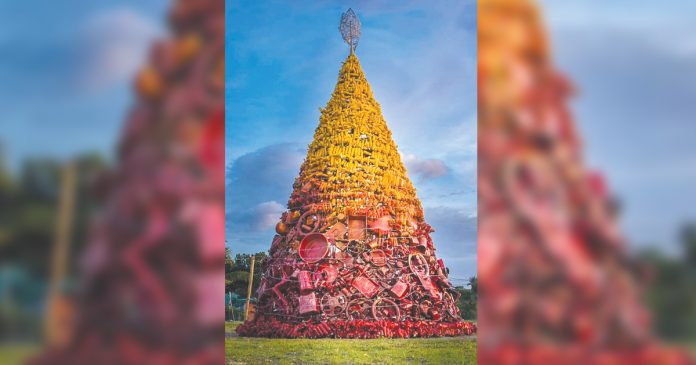 This giant Christmas tree in Pontevedra, Negros Occidental is adorned with decorations made from recycled materials. PHOTO COURTESY OF RMN BACOLOD