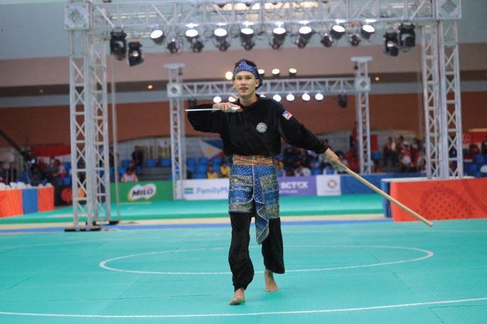 Filipino athlete Edmar Tacuel wins gold in the tunggal male competition of pencak silat at the 30th SEA Games in Subic, Zambales. Inquirer/Grig c. Montegrande