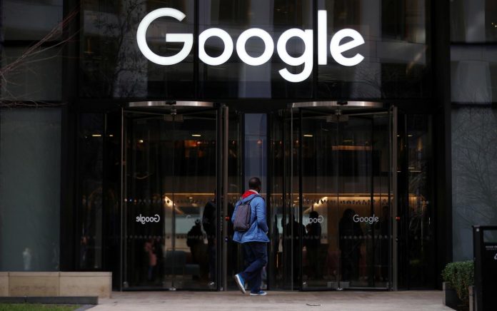 The Google logo is pictured at the entrance to the Google offices in London, Britain. HANNAH MCKAY/REUTERS