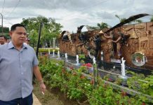 A WALK THROUGH HISTORY. Iloilo’s Gov. Arthur Defensor Jr. inspects the “Panaysayon sang Paranublion” wall at the redeveloped provincial capitol grounds on Bonifacio Drive, Iloilo City. The wall, 15 meters long and two meters high, encapsulates Iloilo’s rich history and heritage through a mix of bas-relief, alto-rilievo (high relief) and fully sculptured figures. IAN PAUL CORDERO/PN