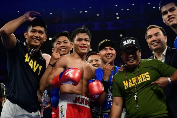 Jerwin Ancajas easily defended his IBF world super flyweight via a sixth-round stoppage win over Chile’s Miguel Gonzales. GETTY IMAGES