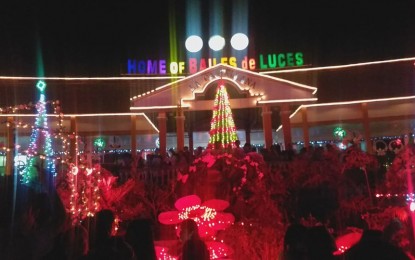 The municipal hall grounds of La Castellana in Negros Occidental is transformed into a garden-like attraction using colorful floral accents reused from plastic materials, lit up by light-emitting diode lights. PHOTO BY ERWIN P. NICAVERA