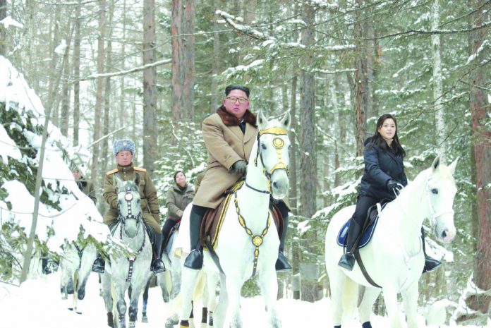 North Korean leader Kim Jong Un rides a horse as he visits battle sites in areas of Mt Paektu, Ryanggang, North Korea, in this undated picture released by North Korea's Central News Agency on Dec. 4, 2019. KCNA via REUTERS