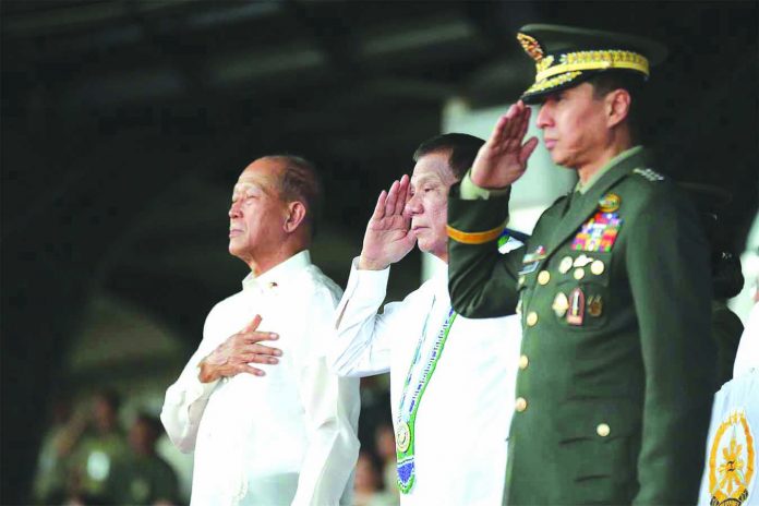 President Rodrigo Duterte leads the awarding ceremony for the outstanding members of the Armed Forces of the Philippines (AFP) during the AFP’s 84th anniversary at the Camp General Emilio Aguinaldo in Quezon City on Dec. 17. PCOO