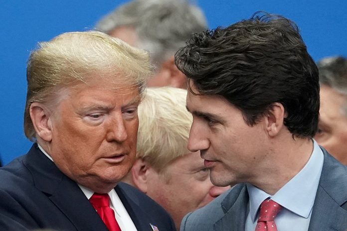 President of the United States Donald Trump talks with Canada’s Prime Minister Justin Trudeau during a North Atlantic Treaty Organization Plenary Session at the North Atlantic Treaty Organization summit in Watford, Britain, Dec. 4, 2019.