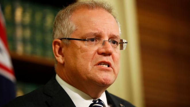 Australian Prime Minister Scott Morrison apologizes on Friday for taking a leave amid the bushfire crisis. GETTY IMAGES