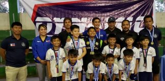 Born 2009 Boys champions St. John’s FC in posterity during the awarding ceremony. CONTRIBUTED PHOTO