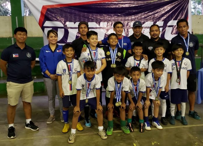 Born 2009 Boys champions St. John’s FC in posterity during the awarding ceremony. CONTRIBUTED PHOTO