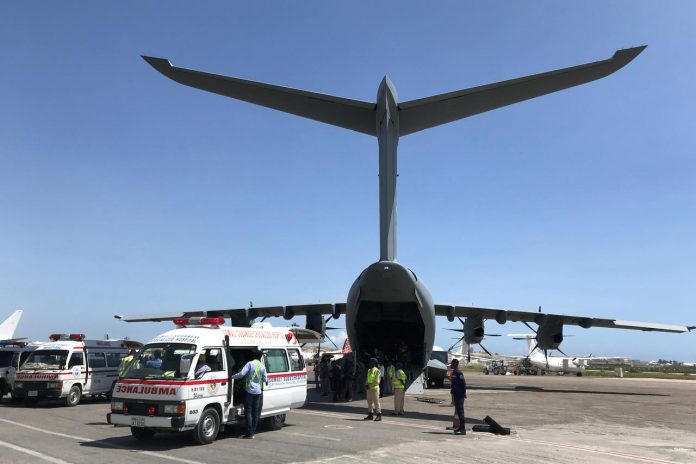 A Turkish military cargo plane prepares to evacuate the car-bomb explosion victims in Aden Abdulle International Airport in Mogadishu, Somalia on Dec. 29. REUTERS/FEISAL OMAR