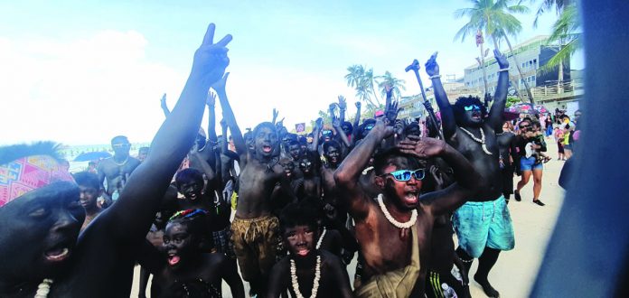 Revelers paint themselves black with soot to imitate the native Atis tribesmen to celebrate the Ati-Atihan Festival in Kalibo, Aklan on Jan. 12. JUN AGUIRRE/PN