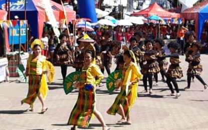 School principals and teachers of the Department of Education-Antique perform during the “Parada ng Lahi” of the Binirayan Festival on Dec. 28, 2019. PNA/ANNABEL CONSUELO J. PETINGLAY