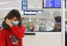 Personnel at the NAIA Terminal 1 in Parañaque City wear face masks as the country heightens measures to prevent the spread of the Novel Coronavirus from China. ABS-CBN News