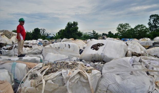 TOXIC MESS The pile of mostly plastic trash stored at the Phividec Industrial Authority compound in Tagoloan, Misamis Oriental, awaiting reshipment to South Korea. PHOTO COURTESY OF JIGGER J. JERUSALEM