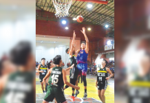 Bacolod Tay Tung High School center Henj Demisana (No. 5) outpowers Colegio de Sta. Ana de Victorias forward Rommel Hechanova during the NBTC Bacolod leg finals. NBTC BACOLOD PHOTO