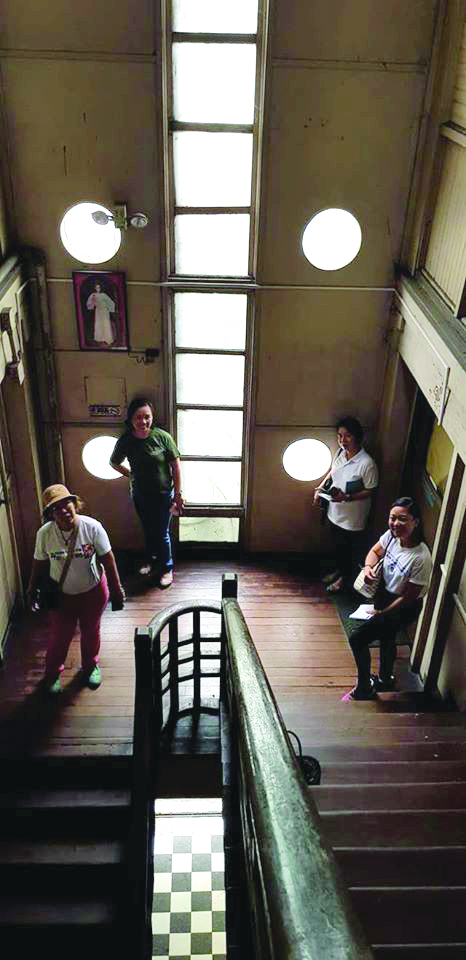 A view of the staircase from the second floor landing