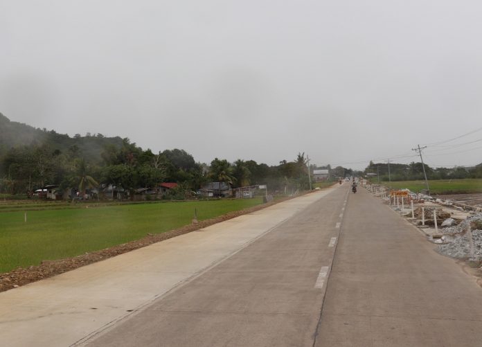 From two lanes to four lanes, the road-widening along Iloilo East Coast Capiz Road in Ajuy, Iloilo will be completed March this year. DPWH, ILOILO 3RD DEO