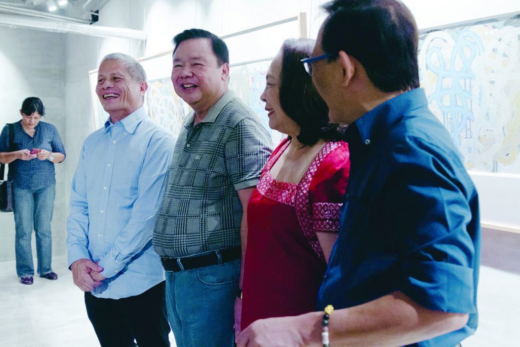 Rock Drilon is joined by Iloilo City mayor Jerry Treñas and Rosalie Treñas. PHOTO BY ERIC BARBOSA JR. / ATMOS.PH 