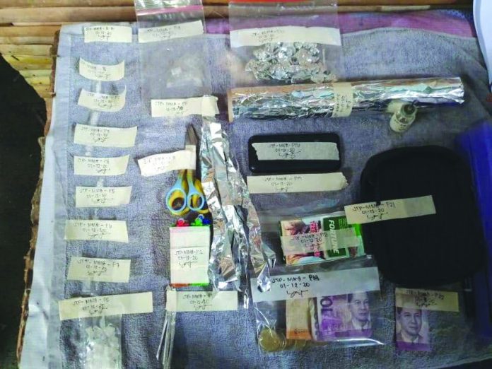 Authorities seized these sachets of suspected and drug paraphernalia in a sting operation in Barangay 5, San Carlos City, Negros Occidental. PDEA REGION 6