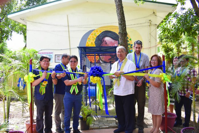 National Water Resources Board executive director Sevillo David Jr. and Science and Technology secretary Fortunato de la Peña (3rd and 4th from left) cut the ribbon during the installation of telemetry sensors for water quality monitoring at Pavia National High School in Iloilo’s Pavia town. JULIUS GABIOTA