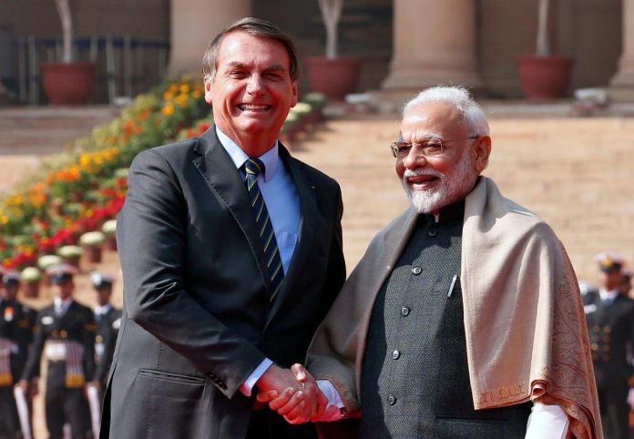 Brazil’s President Jair Bolsonaro (left) shakes hands with India’s Prime Minister Narendra Modi during his ceremonial reception at the forecourt of India’s Rashtrapati Bhavan Presidential Palace in New Delhi, India on Jan. 25. REUTERS/ALTAF HUSSAIN