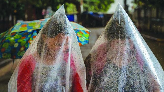 Residents use plastic bags to cover themselves from ash spewed from Taal Volcano’s unrest. Mariton Bornas, personnel of the Philippine Institute of Volcanology and Seismology, said a prolonged eruption could pose a serious challenge for the locals. EZRA ACAYAN/GETTY IMAGES/CNN.COM