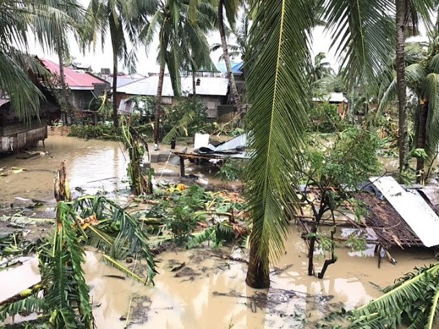 Damaged houses and trees are seen in this inundated area in the aftermath of typhoon “Ursula” that hit Western Visayas on Dec. 25. According to the authorities, around P1.158 billion worth of damages to agriculture and infrastructure were recorded in Aklan due to the typhoon, which displaced thousands of people. AKEAN FORUM