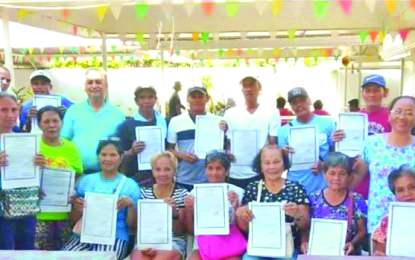 Agrarian reform beneficiaries receive certificates of land ownership award to 24.6 hectares of landholdings in Barangay Consing, E.B. Magalona, Negros Occidental on Jan. 30, 2020. DAR NEGROS OCCIDENTAL-I