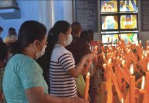 FAITH IN THE TIME OF A VIRUS OUTBREAK. Masked devotees of Nuestra Señora dela Candelaria (Our Lady of Candles) light candles at the Jaro Metropolitan Cathedral in Jaro, Iloilo City. Yesterday was the Candelaria fest, one of the biggest religious feasts in the country. These devotees are wearing a facemask in the hope of avoiding viruses that could make themr sick such as the novel coronavirus which killed a visiting male Chinese tourist in Manila on Saturday and sickened, too, his woman companion. Recently, the Catholic Bishops Conference of the Philippines released an Oratio Imperata (prayer) for people affected by the new virus and the prevention of a global epidemic. IAN PAUL CORDERO/PN