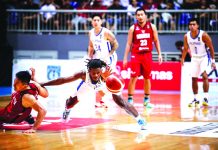 Gilas Pilipinas’ guard CJ Perez hustles for the ball while being challenged by an Indonesian defender during the two countries’ clash last night in Jakarta, Indonesia. FIBA