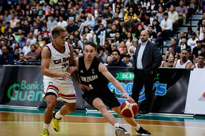 Guam's Jericho Cruz defends New Zealand's Taylor Britt in their FIBA Asia Cup game. Photo by FIBA Media