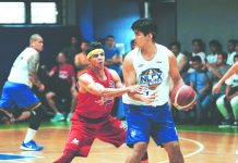 NLEX Road Warriors’ Kris Porter measures the defense of San Miguel Beermen’s Arwind Santos. NLEX PHOTO