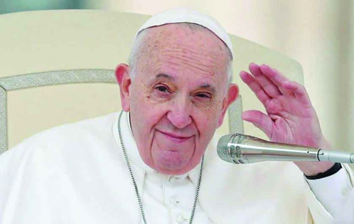 Pope Francis waves during the weekly general audience at Vatican, Feb. 26, 2020. REUTERS