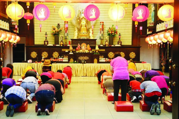 Buddhists in Bacolod City worship at the Fo Guang Shan Yuan Tong Buddhist Temple