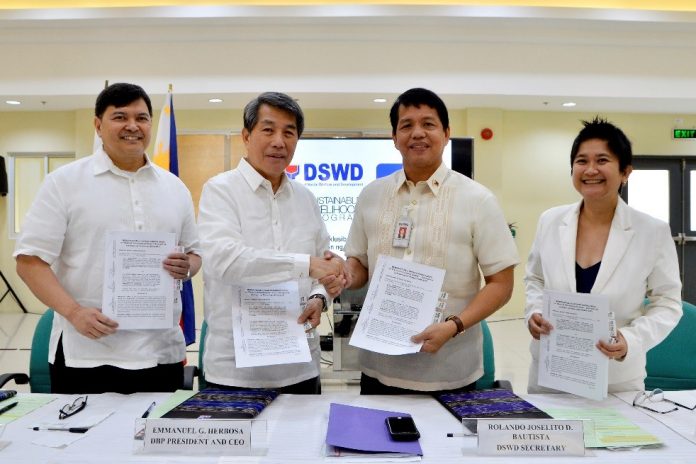 Photo shows DSWD Secretary Rolando Joselito D. Bautista (third from left) and DBP President and Chief Executive Officer Emmanuel G. Herbosa (second from left) during the signing of the memorandum of understanding at the DSWD Head Office in Quezon City. Also present were (left) DBP Executive Vice President Jose Gabino L. Dimayuga and DSWD Assistant Secretary for Specialized Programs Rhea B. Peñaflor (right).